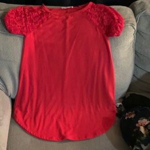 Longer loose fitting top.